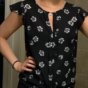 Black blouse with white flowers